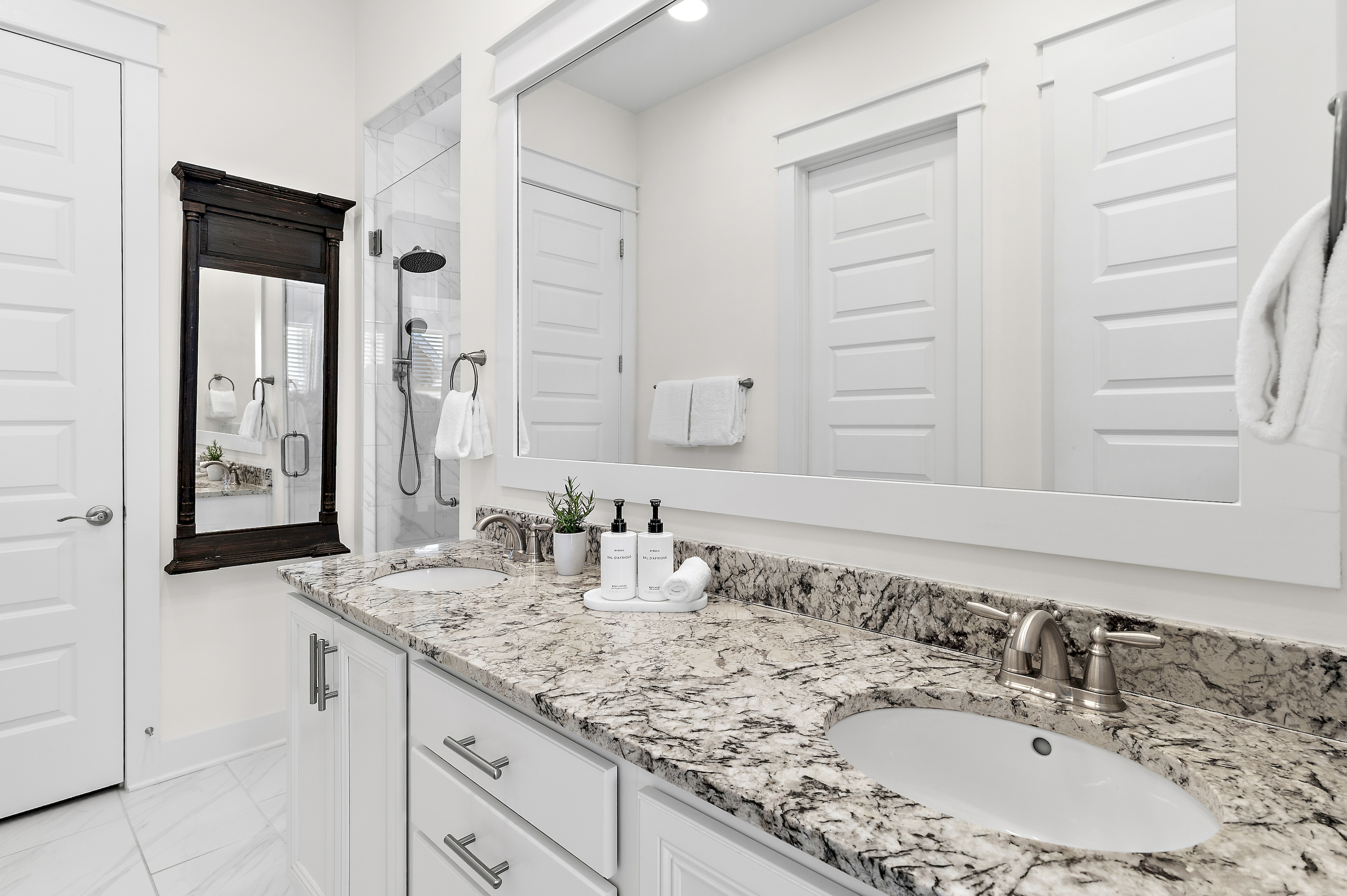 Two sinks, one mirror